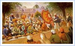 The Mughal Emperor Akbar at Goindwal Sahib enjoying the Guru's Langar prior to paying homage to Guru Amardas